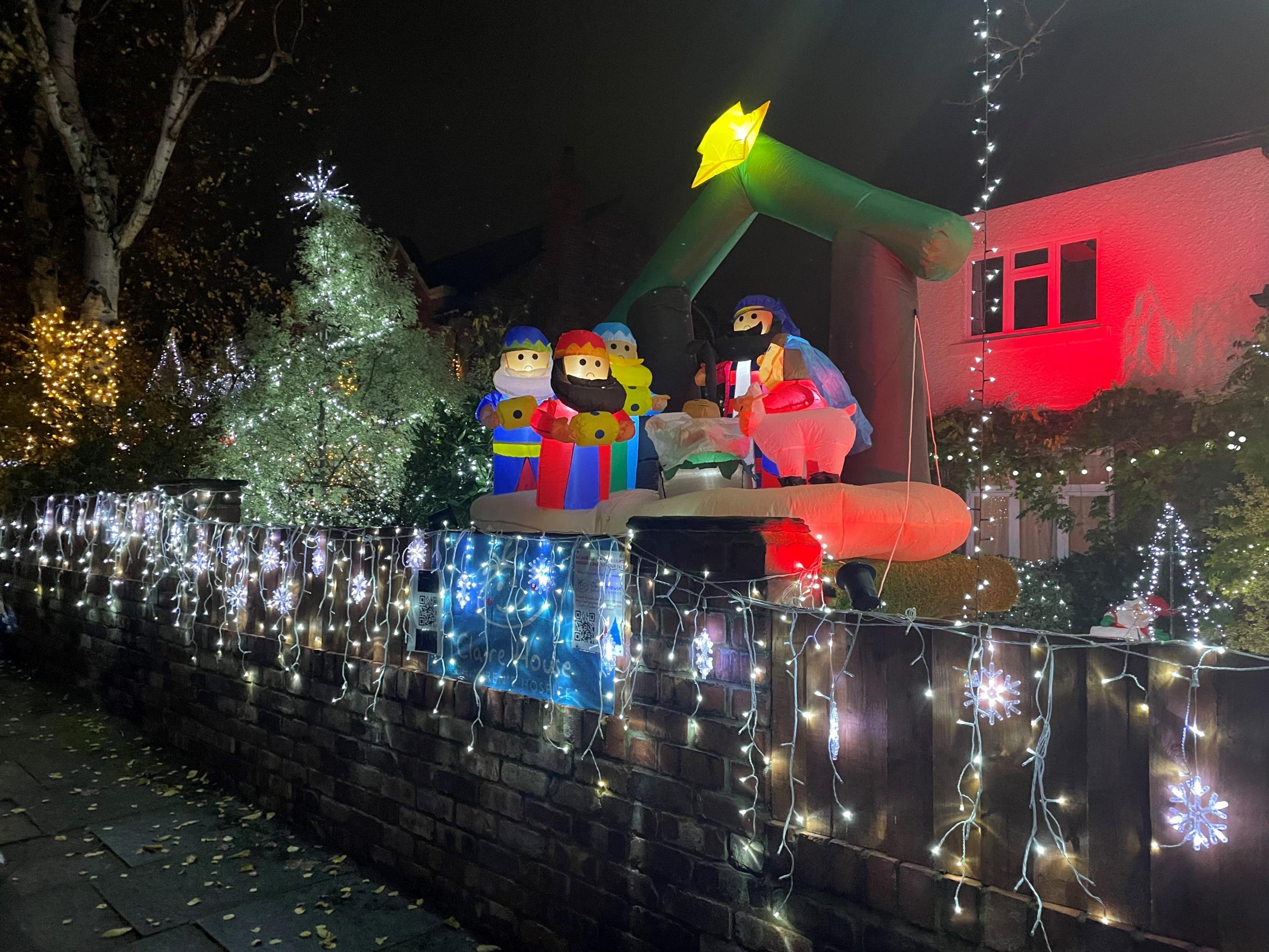 The residents of Templemore Road admit that they love going over the top at Christmas for a good cause