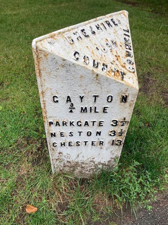A surviving cast iron milestone captured by John Lowe
