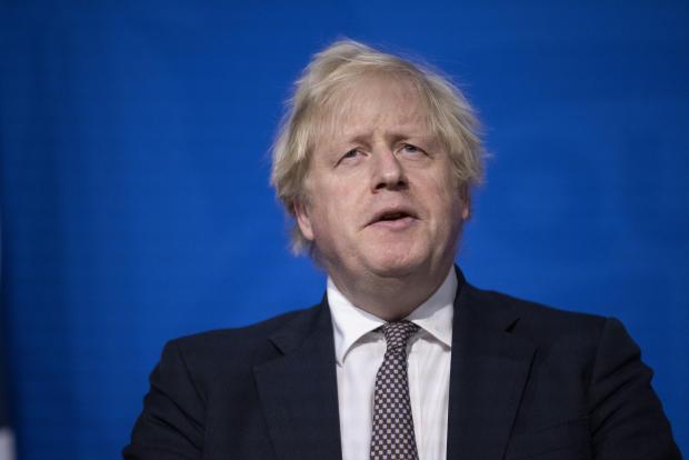 Wirral Globe: Prime Minister Boris Johnson announced the tightening of Covid rules during a press conference at Downing Street (Image: PA)