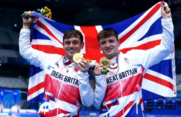 Wirral Globe: Tom Daley (left) and Matty Lee have been made MBEs. Picture: PA