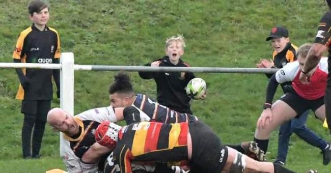 Caldy score a try against Cinderford, delighting young supporters. Photo: Barry McDonald