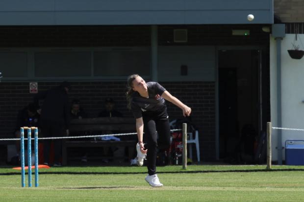 Sophie Morris on her way to recording remarkable figures of 6-0 of her Lancashire Academy debut