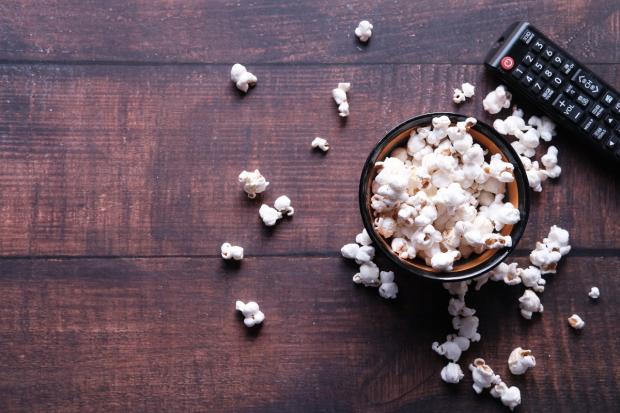 Wirral Globe: A bowl of popcorn and a TV remote (Canva)