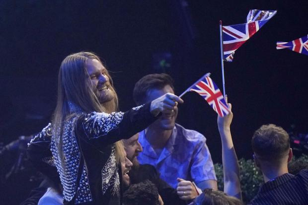 Sam Ryder from United Kingdom reacts during the Grand Final of the Eurovision Song Contest at Palaolimpico arena, in Turin, Italy, Saturday, May 14, 2022. (AP Photo/Luca Bruno).