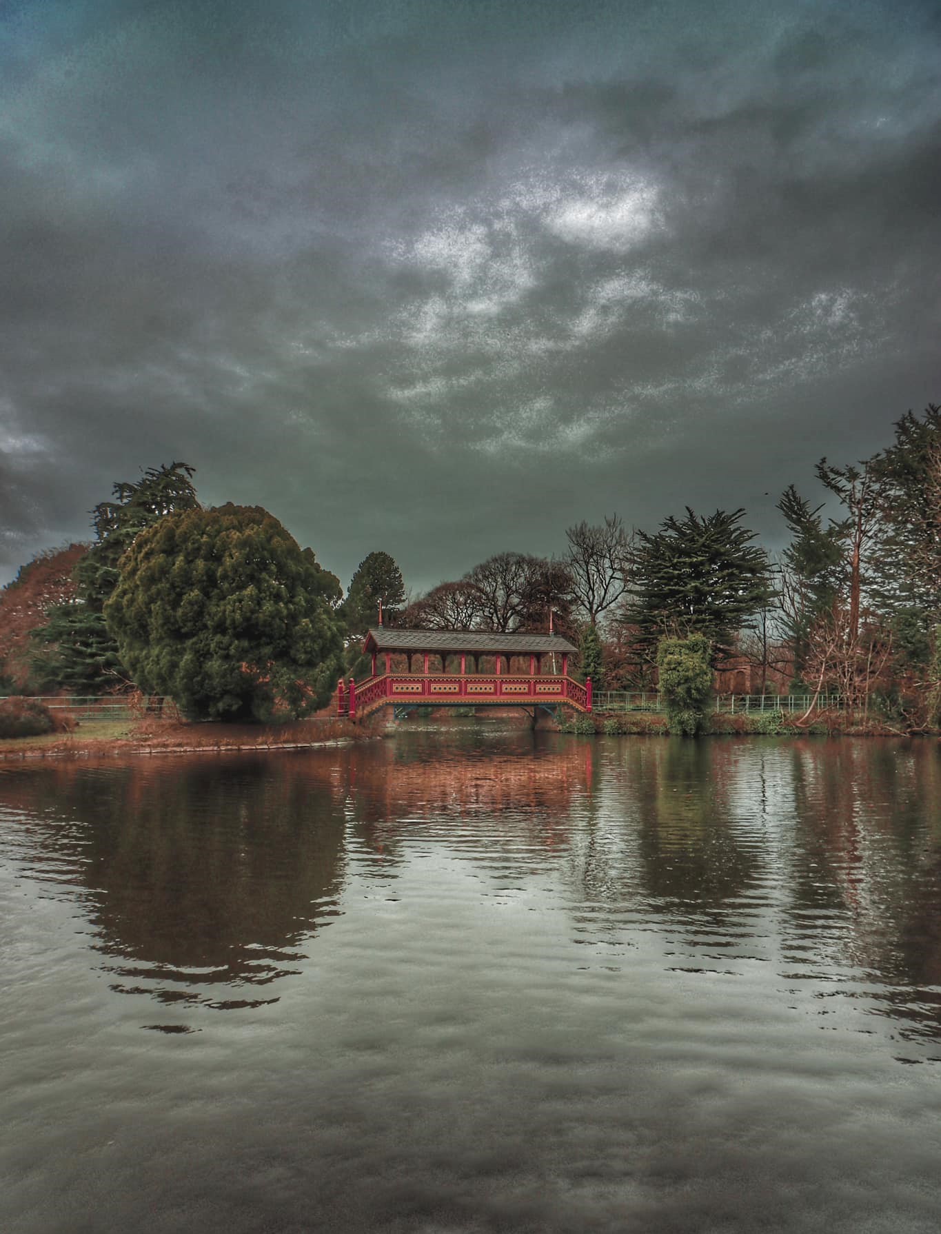 A storm is coming at Birkenhead Park by Allan Carruthers