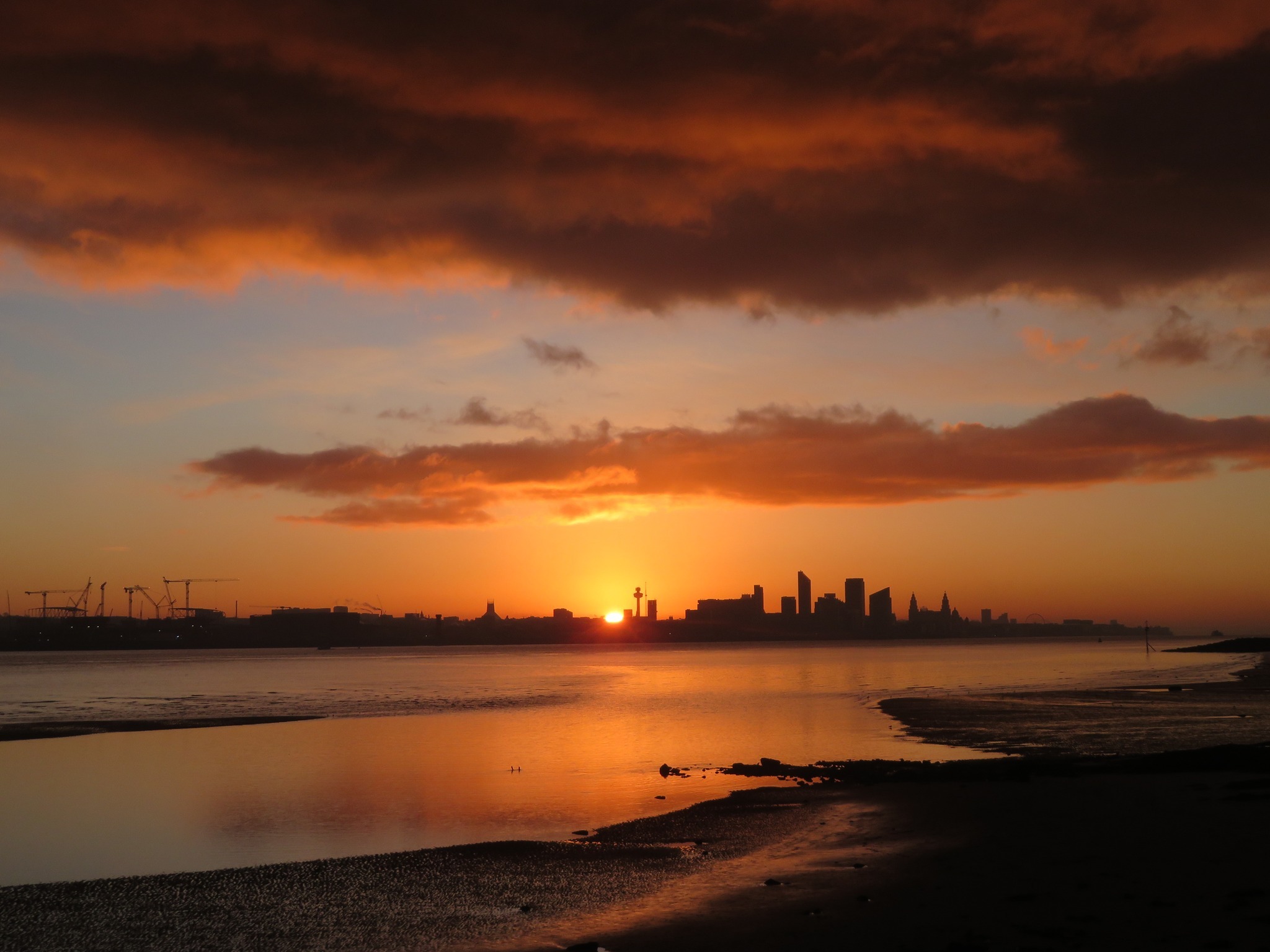Sunrise over the Mersey by Jan E Peddie