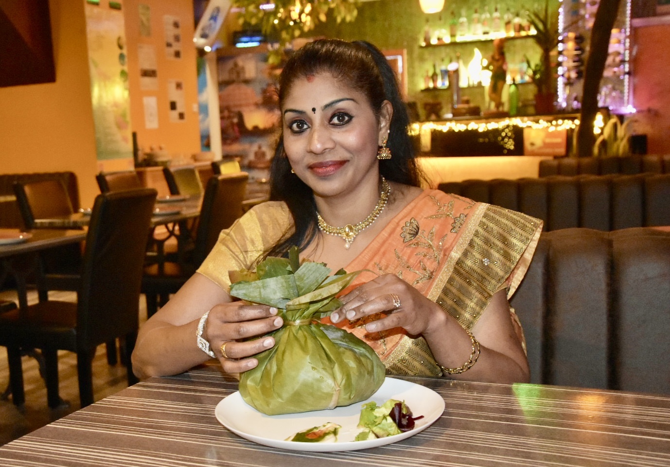 Jisha Sabuji with a chefs special in a banana leaf