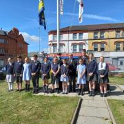 Pupils and staff from Egremont Primary after raising the Ensign on Monday