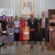 Wirral's Mayor and Mayoress; Clllr Jeff and Carol Green, with Ronan Kearney, chair of Wirral Sports Forum and Dave Simmonds representing Wirral Council’s Sports Development team with the bursary award winners.