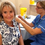 Karen Howell having her flu vaccination