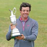 Rory McIlroy lifts the iconic Claret Jug at Hoylake in 2014
