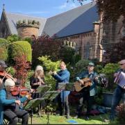Musicians perform during last year's Oxton Secret Gardens festival