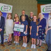 The Mayor and Mayoress of Wirral with Ronan Kearney, chair of the Wirral Sports Forum and Dave Simmonds representing Wirral Council’s Sports Development team with the bursary award winners