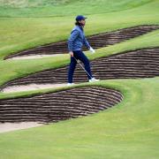 Tommy Fleetwood walks onto the 18th during day two of The Open at Royal Liverpool, Wirral.