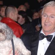 Paul O'Grady and his dog Buster arriving for the National Television Awards in 2005
