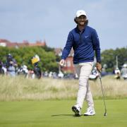 England's Tommy Fleetwood smiles after a birdie putt on the 16th hole on the first day of the British Open Golf Championships at the Royal Liverpool Golf Club in Hoylake, England, Thursday, July 20, 2023. (AP Photo/Jon Super).