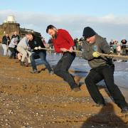 Mersey Divers giving their all during last year's tug o'war on New Brighton beach
