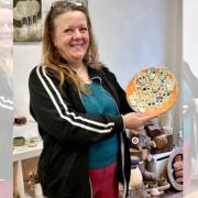 Potter Nett Furley with her hand made plate that will be on view in exhibition at The Rathbone Studio