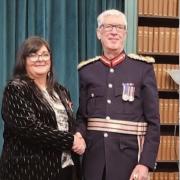 Sally Ralston BEM pictured with the Lord Lieutenant of Liverpool, Mark Blundell