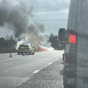 Firefighters tackled an incident involving a burning car on the M53.