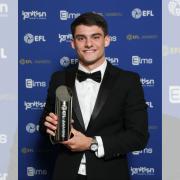 Rob Apter picks up the League Two Young Player of the Season award from the EFL