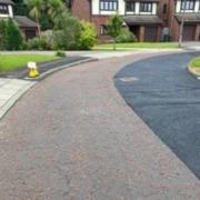 'Cosmetic' repair work, which will see black asphalt laid on Limehurst Grove's road in Bromborough began on April 14 and is being carried out by a sub-contractor working for Keely Contractors