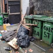 Rubbish that has piled up on Grange Place in Birkenhead
