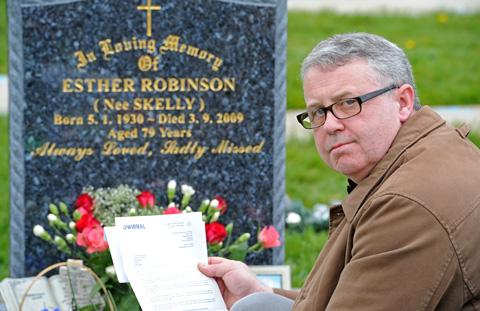 FLASHBACK: James Robinson places council letter of apology for care delay on his mother's grave