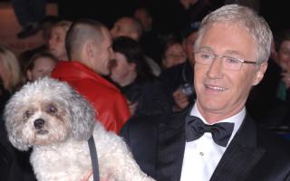 Paul O'Grady and his dog Buster arriving for the National Television Awards in 2005