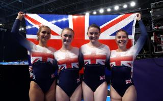 Great Britain's Bethany Williamson, Molly McKenna, Ruth Shevelan and Kirsty Way celebrate winning gold in the Women's Double Mini trampoline team final during day two of the 2023 FIG Trampoline Gymnastics World Championships in Birmingham
