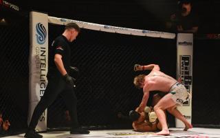 MMA fighter Billy Adams in action