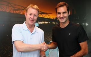 Handout photo provided by Associated Newspapers of Mike Dickson, tennis correspondent for the Daily Mail, with Roger Federer