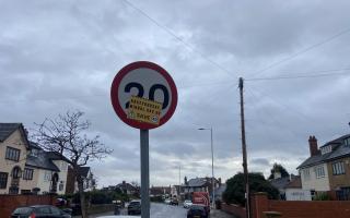 A 20mph speed limit covered by a sticker opposing the rollout. This limit has been in place since at least 2016. Credit: Edward Barnes