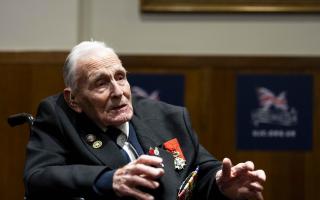 D-Day veteran John Dennett, 99, from Liverpool, who served with the Royal Navy on board LST 322 offloading troops and heavy equipment at Sword Beach, and returning injured troops and prisoners to Portsmouth
