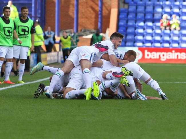 Celebrations after Jay Harris hits the net for Rovers