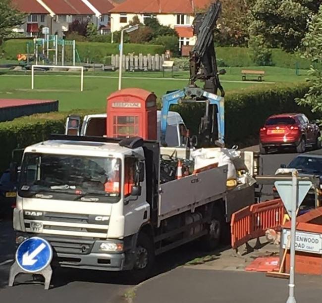 The famous telephone kiosk being removed from its home in Greenwood Road, Meols, back in August