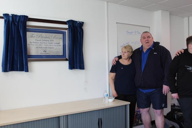 Barbara Lavelle (Paul Lavelle's mother) and Neville Southall unveil a plaque at the launch
